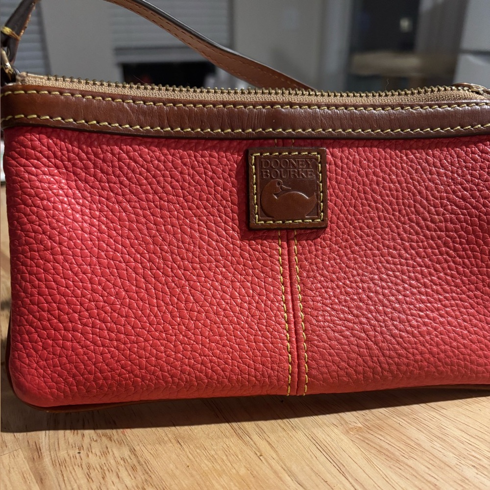 Dooney & Bourke Coral pebbled leather wristlet